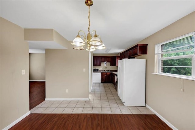 4701 Flat Shoals Rd Unit 37H, Union City, GA 30291 - kitchen featuring white appliances, a chandelier, a sink, and baseboards