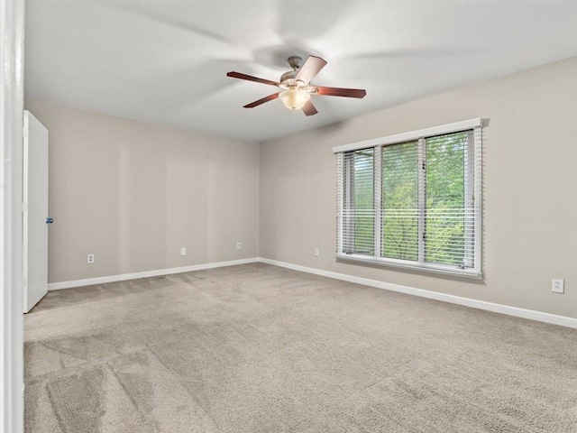 95 Ivy Trl NE, Atlanta, GA 30342 - unfurnished room featuring a ceiling fan, baseboards, and carpet floors