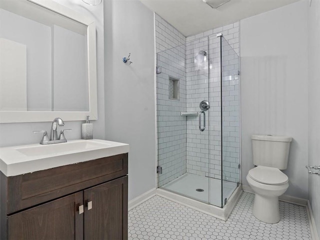 95 Ivy Trl NE, Atlanta, GA 30342 - full bathroom featuring a stall shower, toilet, vanity, and tile patterned floors