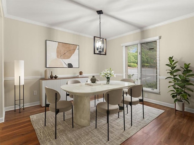 95 Ivy Trl NE, Atlanta, GA 30342 - dining room with wood finished floors, ornamental molding, baseboards, and a chandelier