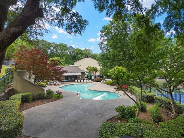 95 Ivy Trl NE, Atlanta, GA 30342 - view of pool featuring a patio area and fence