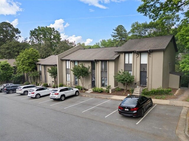 95 Ivy Trl NE, Atlanta, GA 30342 - view of building exterior featuring uncovered parking