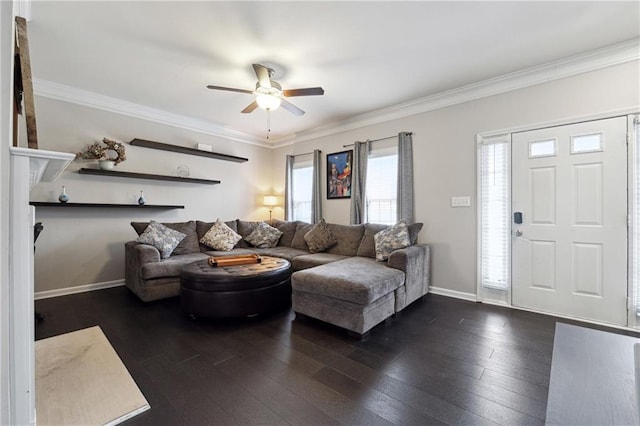 living area with crown molding, baseboards, and dark wood-style flooring