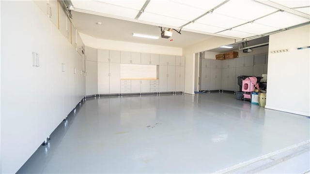 715 Laura Jean Ct, Buford, GA 30518 - garage featuring a garage door opener