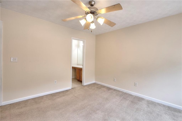 6344 Wellington Walk Way, Lithonia, GA 30058 - spare room featuring light carpet, baseboards, and ceiling fan