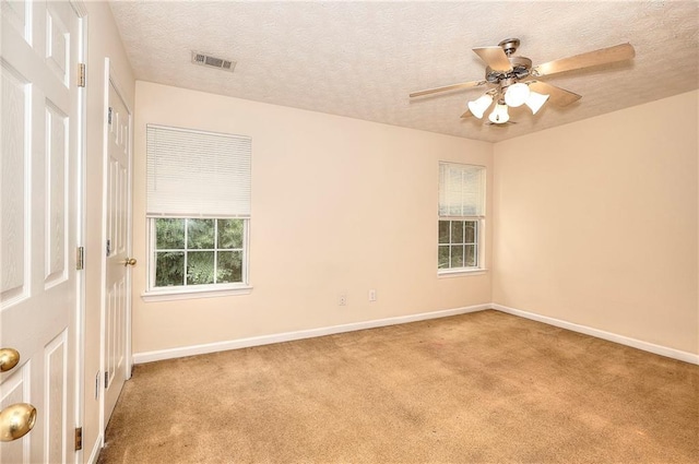 6344 Wellington Walk Way, Lithonia, GA 30058 - empty room with carpet floors, baseboards, a ceiling fan, and a textured ceiling