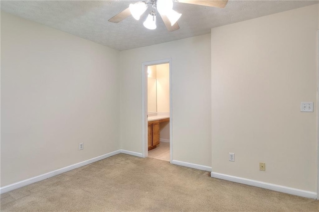 6344 Wellington Walk Way, Lithonia, GA 30058 - empty room featuring light carpet, ceiling fan, baseboards, and a textured ceiling