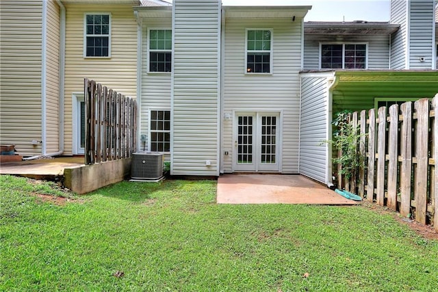 6344 Wellington Walk Way, Lithonia, GA 30058 - rear view of property featuring central AC unit and a patio