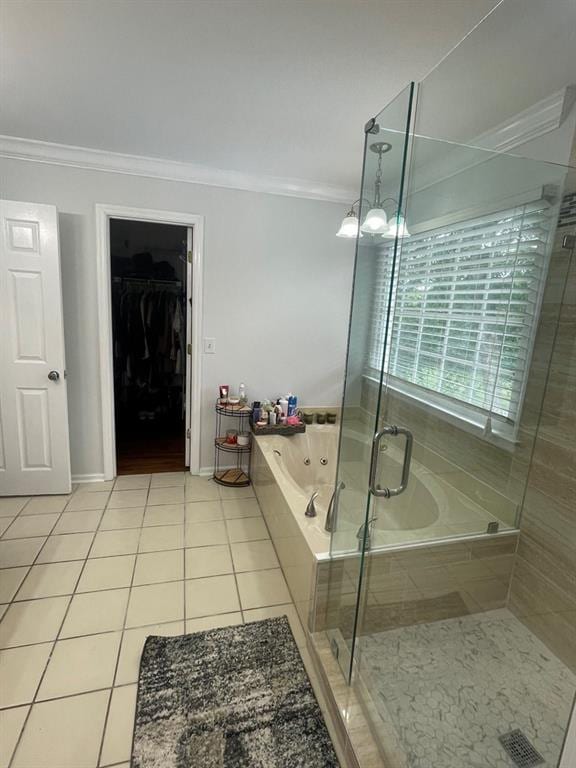 bathroom with crown molding, independent shower and bath, and tile patterned flooring