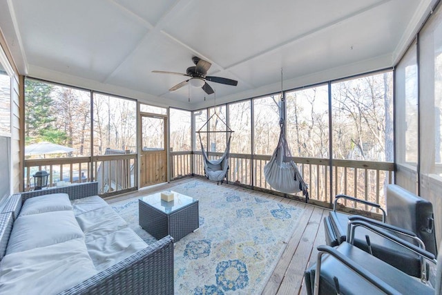 sunroom featuring plenty of natural light and ceiling fan