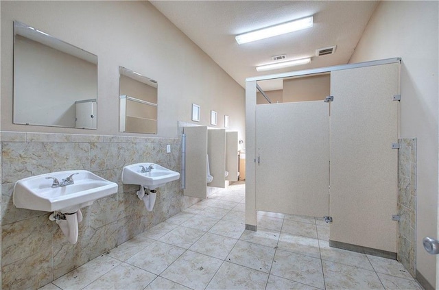 1195 Grady Rd, Rockmart, GA 30153 - bathroom with a sink, tile patterned floors, and tile walls