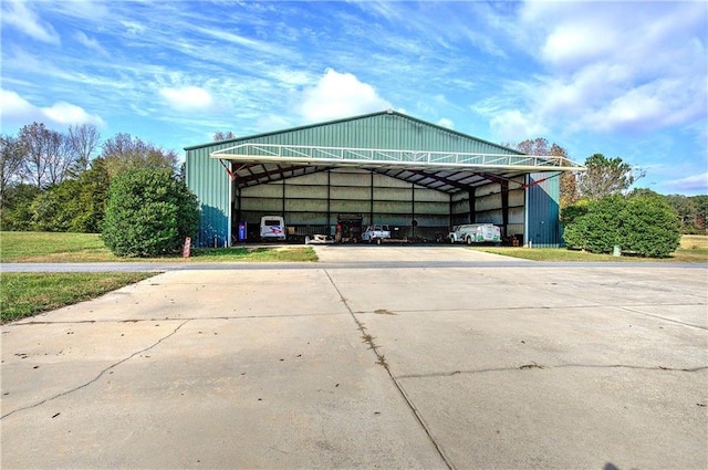 1195 Grady Rd, Rockmart, GA 30153 - view of car parking featuring concrete driveway and a detached carport