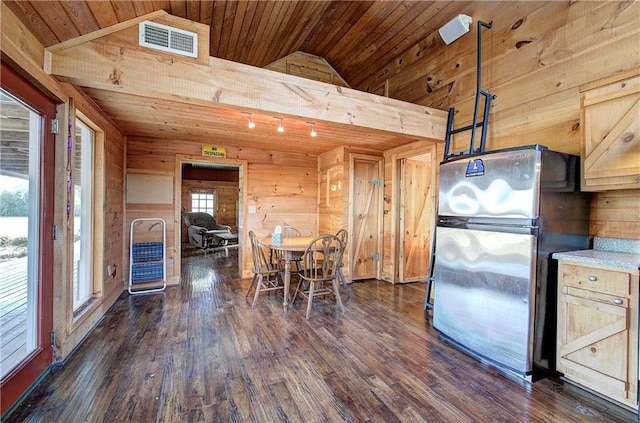 1195 Grady Rd, Rockmart, GA 30153 - dining area with vaulted ceiling, wood ceiling, wood walls, and dark wood-style floors