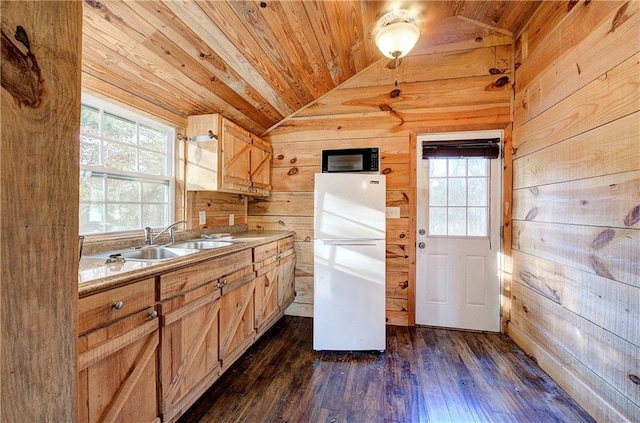 1195 Grady Rd, Rockmart, GA 30153 - kitchen featuring freestanding refrigerator, wood walls, wooden ceiling, vaulted ceiling, and healthy amount of natural light