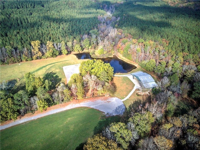 1195 Grady Rd, Rockmart, GA 30153 - aerial view of property and surrounding area featuring a heavily wooded area