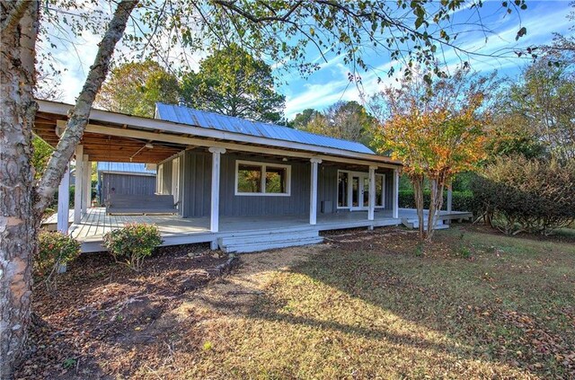 1195 Grady Rd, Rockmart, GA 30153 - view of front of home with covered porch and metal roof