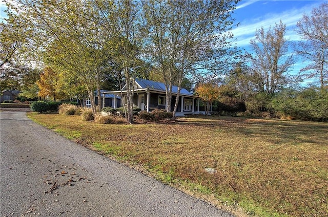 1195 Grady Rd, Rockmart, GA 30153 - view of front of house featuring a front lawn and covered porch