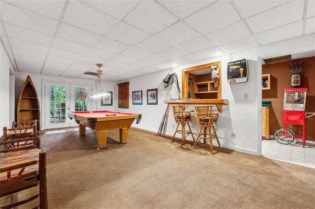 1042 Bailey Rd, Woodstock, GA 30188 - game room with carpet floors, a drop ceiling, pool table, and french doors