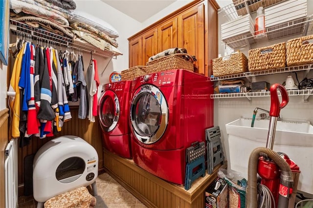 1042 Bailey Rd, Woodstock, GA 30188 - laundry area featuring washer and clothes dryer and cabinet space