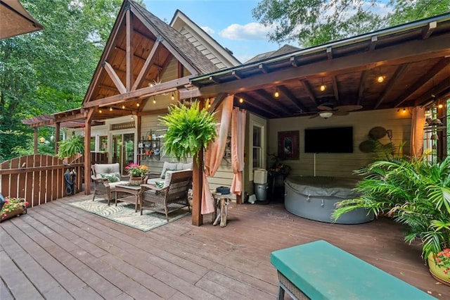 1042 Bailey Rd, Woodstock, GA 30188 - wooden deck with ceiling fan and outdoor lounge area