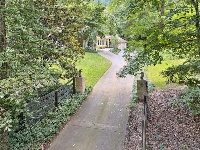 1042 Bailey Rd, Woodstock, GA 30188 - view of yard with concrete driveway
