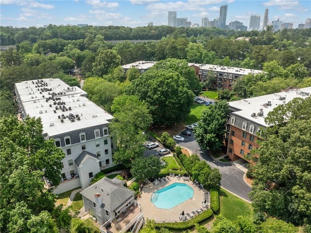 23307 Plantation Dr NE, Atlanta, GA 30324 - drone / aerial view of a pool and city skyline