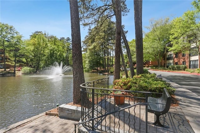 23307 Plantation Dr NE, Atlanta, GA 30324 - surrounding community featuring a water view and view of wooded area