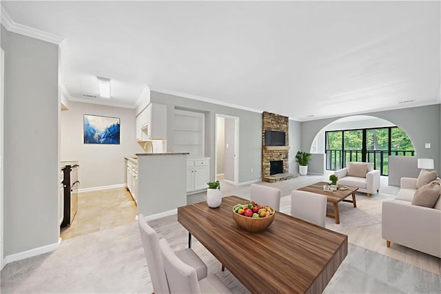 23307 Plantation Dr NE, Atlanta, GA 30324 - living area with a fireplace, ornamental molding, and baseboards