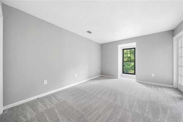 23307 Plantation Dr NE, Atlanta, GA 30324 - unfurnished room with baseboards and carpet flooring