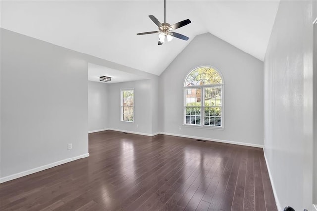 unfurnished living room featuring ceiling fan, wood finished floors, vaulted ceiling, and baseboards