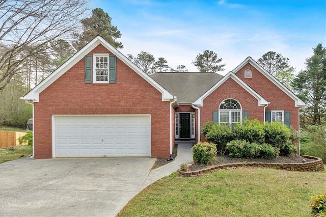 view of front of property featuring concrete driveway, a front yard, and brick siding