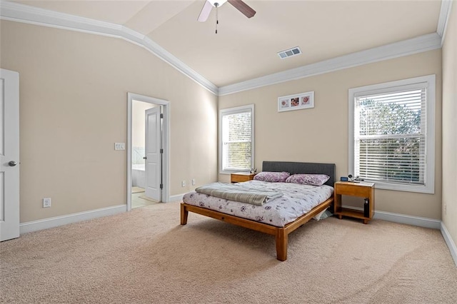 carpeted bedroom featuring visible vents, vaulted ceiling, and ornamental molding