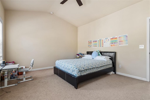 carpeted bedroom featuring vaulted ceiling, baseboards, and ceiling fan