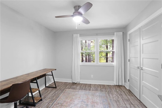 2445 Kings Point Dr, Dunwoody, GA 30338 - unfurnished office with wood finished floors, ceiling fan, and baseboards