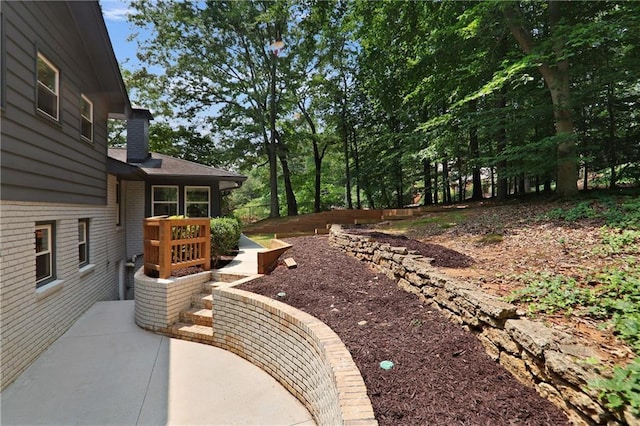2445 Kings Point Dr, Dunwoody, GA 30338 - view of yard with a patio