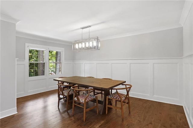 2445 Kings Point Dr, Dunwoody, GA 30338 - dining space with a decorative wall, ornamental molding, dark wood-style floors, and a wainscoted wall