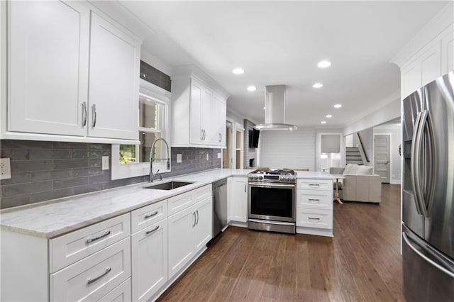 2445 Kings Point Dr, Dunwoody, GA 30338 - kitchen with stainless steel appliances, island exhaust hood, a sink, a peninsula, and open floor plan