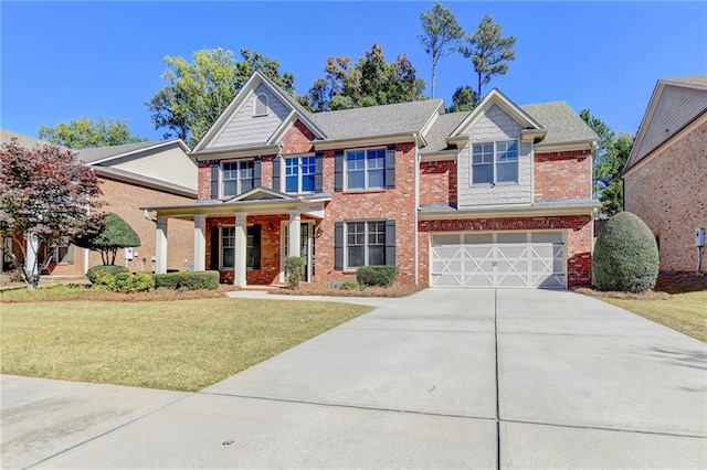 craftsman-style home featuring a front yard and a garage