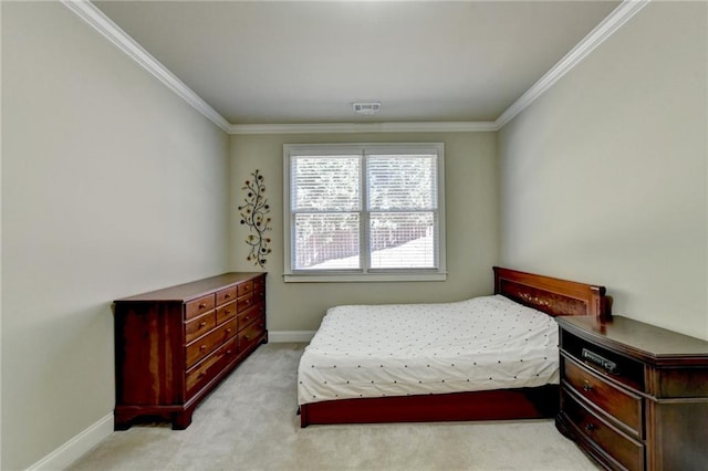 bedroom featuring crown molding and light colored carpet