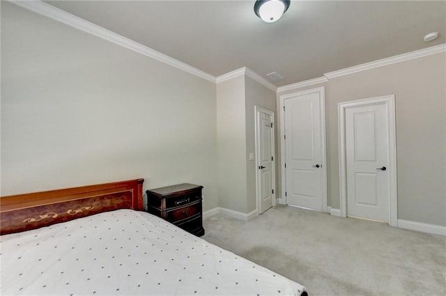 carpeted bedroom featuring crown molding