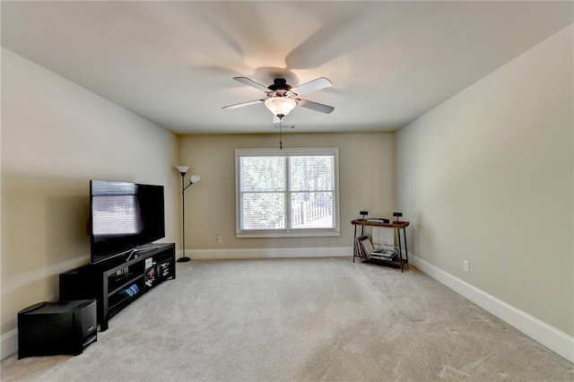 living room with light carpet and ceiling fan