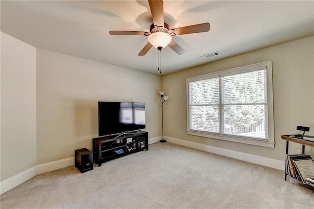 interior space featuring ceiling fan