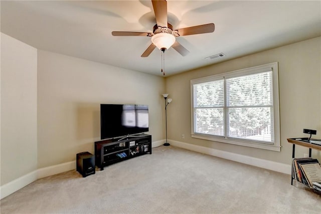 3191 Lake Mcginnis Dr, Suwanee, GA 30024 - carpeted living room featuring baseboards and a ceiling fan