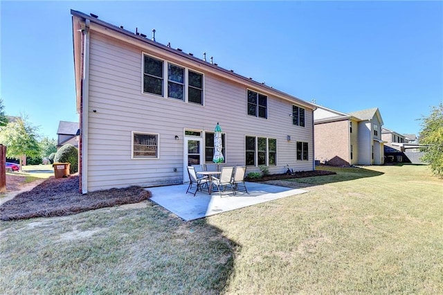 3191 Lake Mcginnis Dr, Suwanee, GA 30024 - back of property featuring a patio and a lawn
