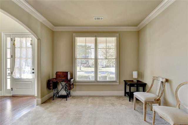 3191 Lake Mcginnis Dr, Suwanee, GA 30024 - sitting room with arched walkways, crown molding, baseboards, and carpet floors