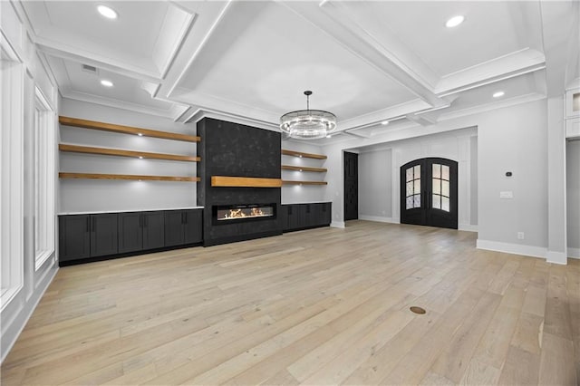 407 Thunder Rd, Buford, GA 30518 - unfurnished living room with french doors, beamed ceiling, a fireplace, coffered ceiling, and light wood-style floors