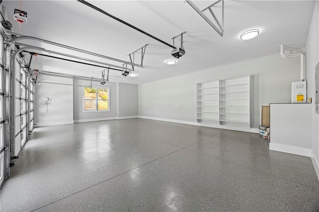 407 Thunder Rd, Buford, GA 30518 - garage with a garage door opener and baseboards