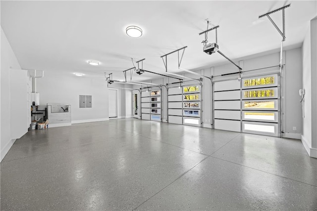 407 Thunder Rd, Buford, GA 30518 - garage with a garage door opener, baseboards, and electric panel
