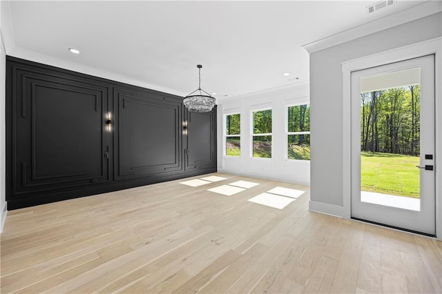 407 Thunder Rd, Buford, GA 30518 - unfurnished dining area with light wood-style floors, a chandelier, and recessed lighting