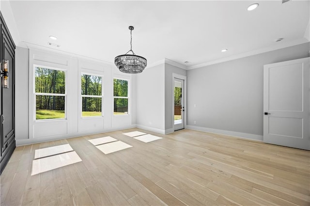 407 Thunder Rd, Buford, GA 30518 - unfurnished dining area featuring a chandelier, ornamental molding, light wood-type flooring, baseboards, and recessed lighting
